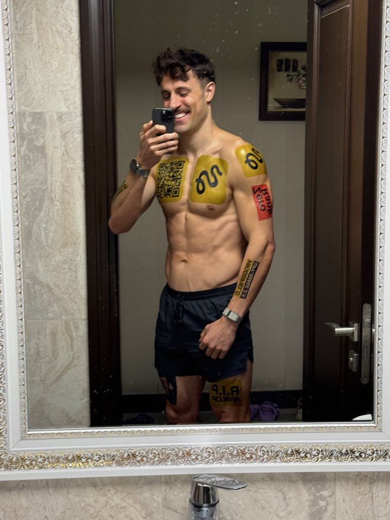 Custom temporary tattoo branding applied to chest, arm and leg placements